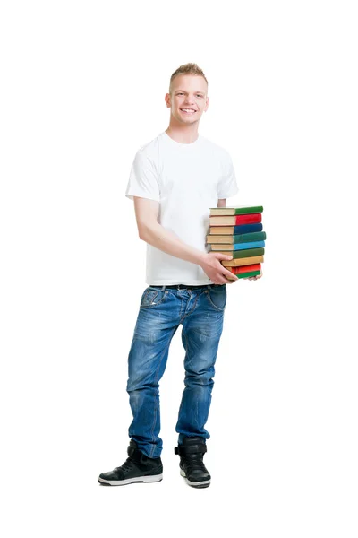 Pupil holding a stack of books isolated on white — Stock Photo, Image