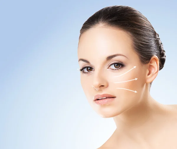 Portrait of young, beautiful and healthy woman with mineral salt — Stock Photo, Image