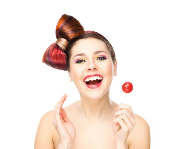 Smiling woman with lollipop — Stock Photo, Image