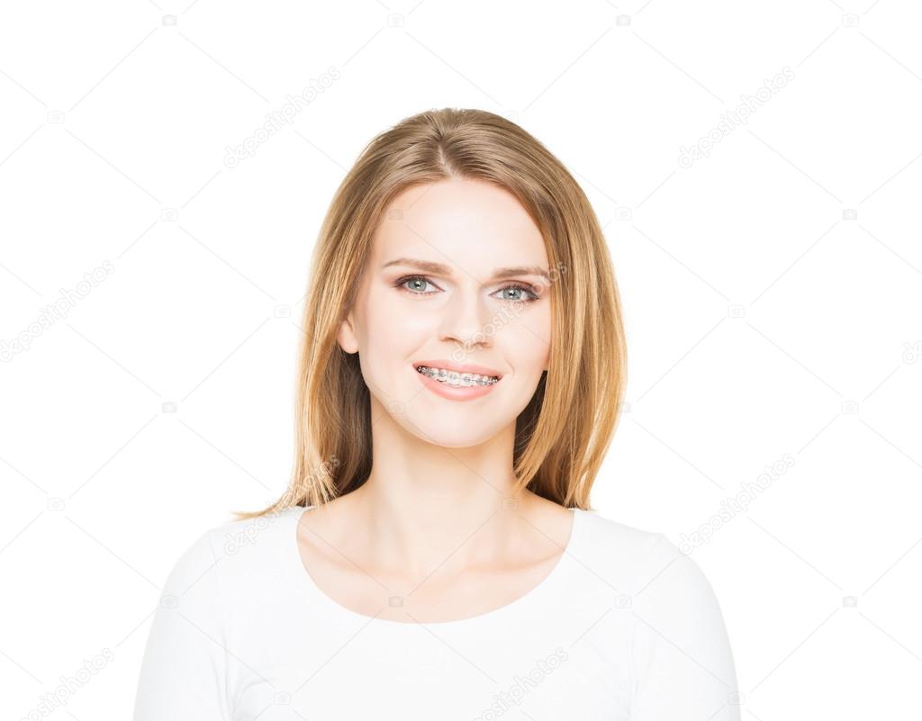 teenage girl smiling in teeth retainer