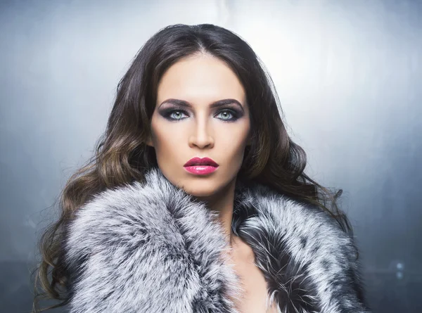 Gorgeous woman  in fur with makeup — Stock Photo, Image