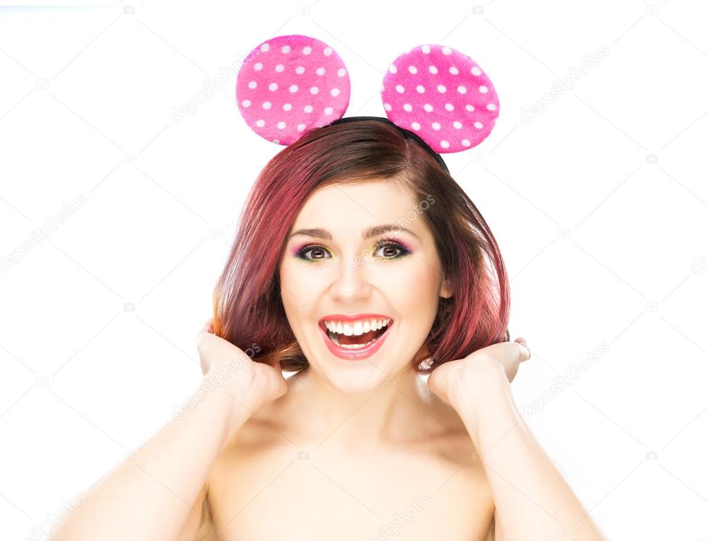 woman in Mickey mouse ears