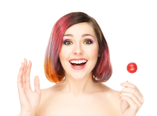 Beautiful smiling woman with a lollipop — Stock Photo, Image