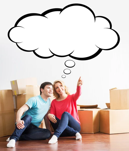 Young couple moving in a new home — Stock Photo, Image