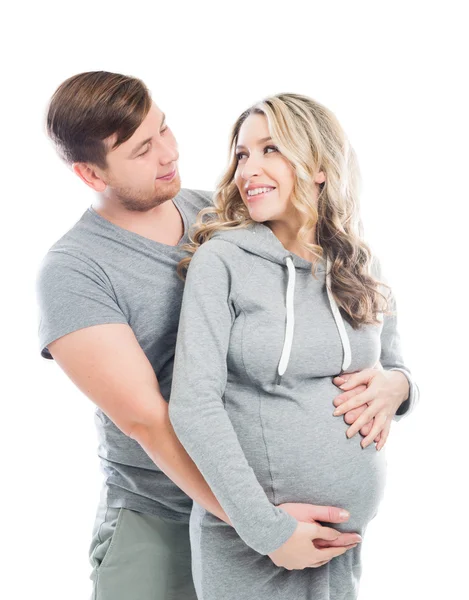 Husband and pregnant wife hugging each other — Stock Photo, Image