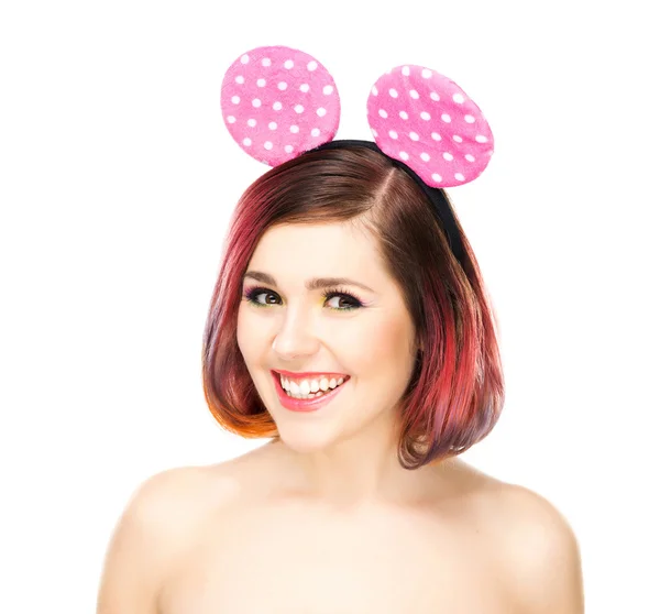 Smiling woman in mickey mouse ears — Stock Photo, Image