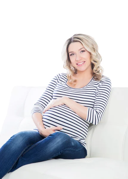 Blonde zwangere vrouw in een gestreepte shirt — Stockfoto