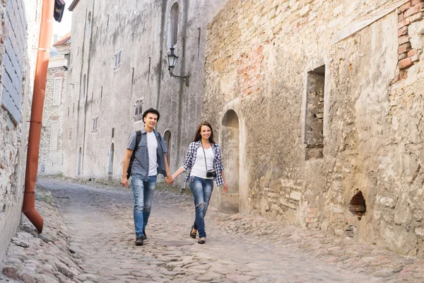 travelling couple having a medieval walk