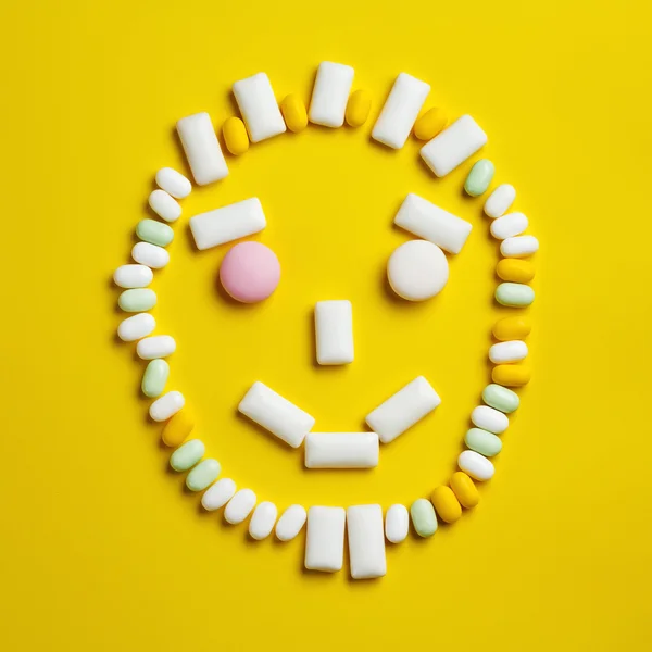 Funny smily face made of chewing gums — Stock Photo, Image