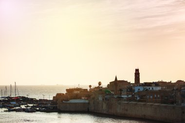 Old city of Akko at the sunset clipart