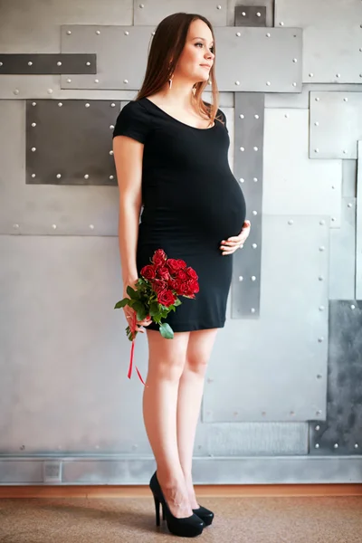 Beautiful elegant woman waiting a baby — Stock Photo, Image