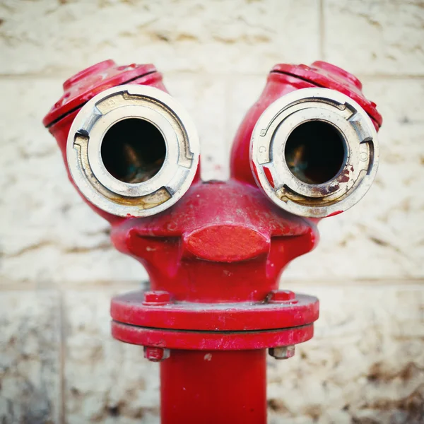 Red old fire hydrant on a street — Stock Photo, Image