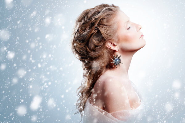 Beautiful girl with glamour Christmas makeup