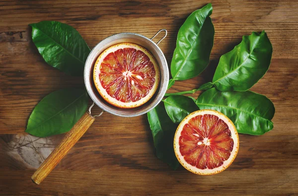 Sangre naranja fruta mitad primer plano —  Fotos de Stock