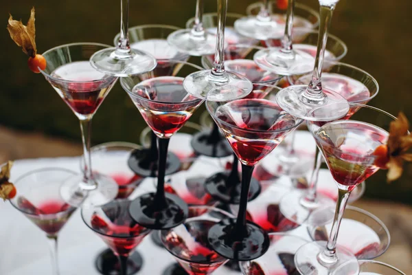 Rows of Champagne Glasses with Color Cocktails — Stock Photo, Image