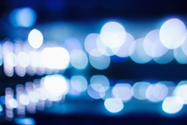 Koyu arka plan mavi Bokeh ışıkları