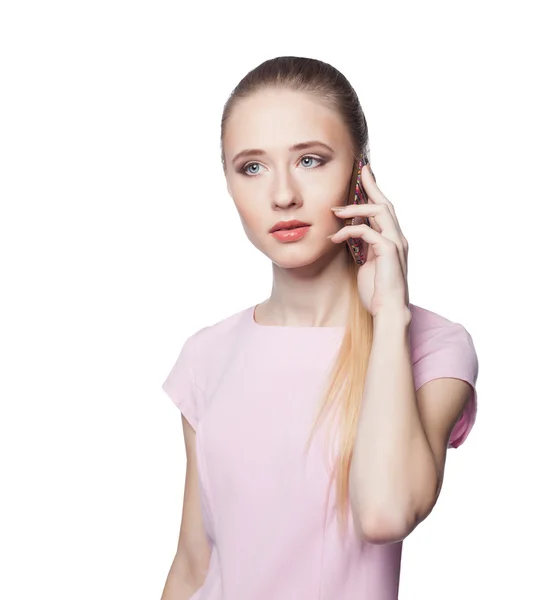 Beautiful young blond woman on the phone. Isolation on a white background — Stock Photo, Image