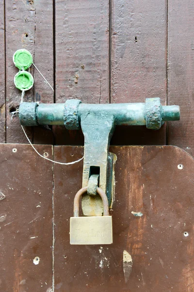 Locked door with padlock — Stock Photo, Image