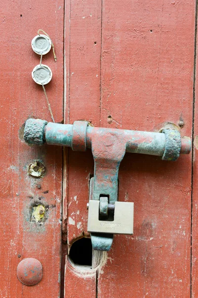 Locked door with padlock — Stock Photo, Image