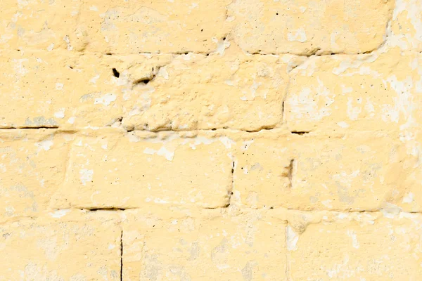 Žlutá kamenná zeď — Stock fotografie