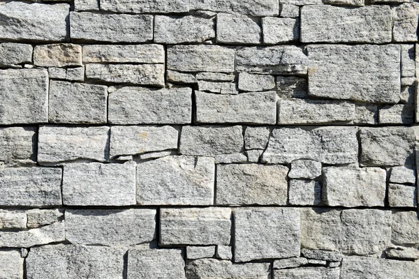 Modello grigio di decorativo marrone grigio ardesia muro di pietra — Foto Stock