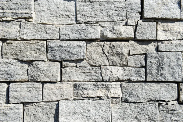 Grå mönster av dekorativa bruna grå skiffer stenmur — Stockfoto