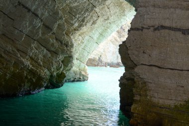 Cave on the coast of Gargano National park clipart