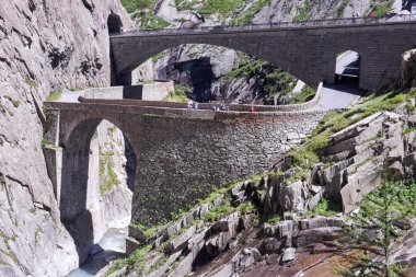Devil's bridge at St. Gotthard pass on the Swiss alps clipart