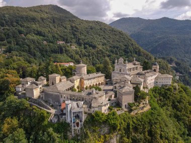 Drone view at the sacred mount of Varallo on Italy clipart