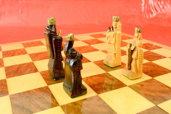 Chess board with two kings and two queens — Stock Photo, Image