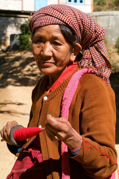 Woman with handicraft at the village of Joate on the mountains o — Stock Photo, Image
