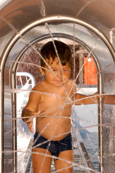 Little  boy at a waterpark — Stock Photo, Image