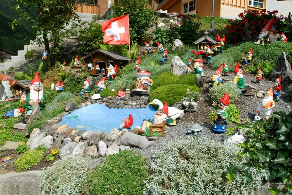 Garden gnomes in a garden — Stock Photo, Image