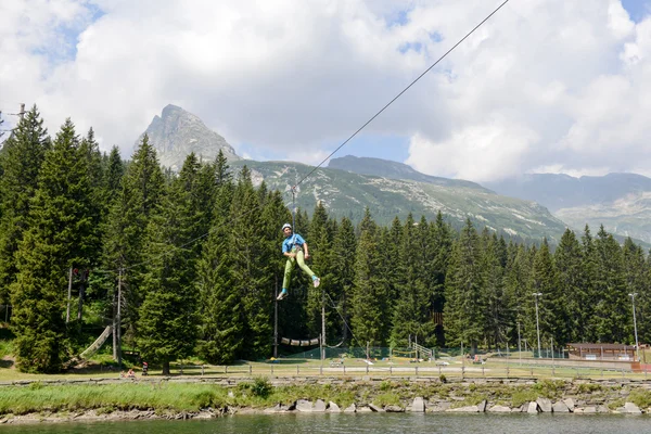 Girl in the adventure rope park of San Bernardino — Stock Photo, Image