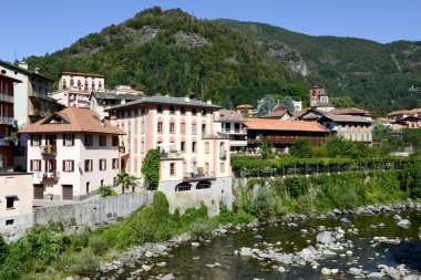 Rocky river in village of Varallo clipart