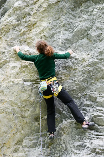 Person climbing on the rock at Engelberg — Stock Photo, Image