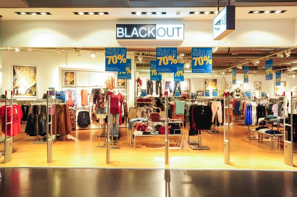 Interior of Black Out fashion clothes store — Stock Photo, Image