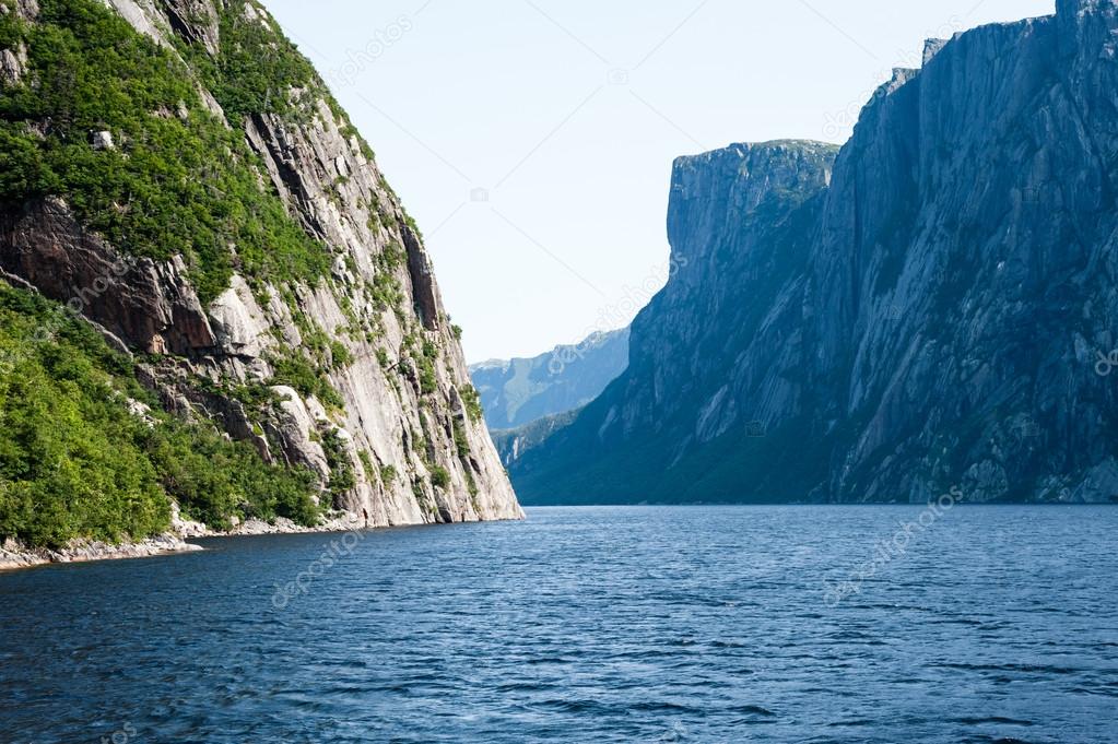 Inland fjord between large steep cliffs