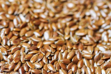 Keten tohumu, keten tohumu yakın çekim. Bir grup Linum usitatissimum - yaygın keten tohumu. Diyet için sağlıklı vejetaryen besleyici.