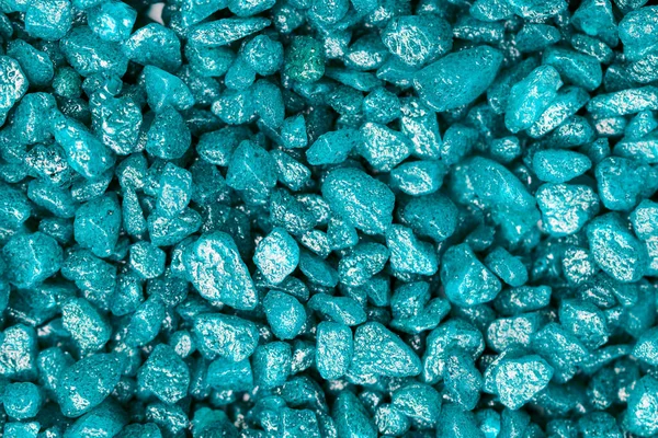 Turquoise gemstone fake pattern. Blue glitter stones for garden decoration, flat lay, top view background.