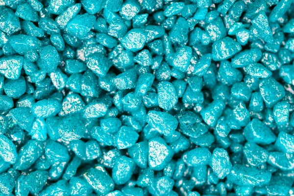 Turquoise gemstone fake pattern. Blue glitter stones for garden decoration, flat lay, top view background.
