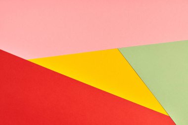 Çok renkli kağıt arkaplan. Soyut renkli kağıt dokusu, kopyalama alanı. Tasarım için parlak renkler geometrik arkaplan. Sunumlar için renk boşluğu.