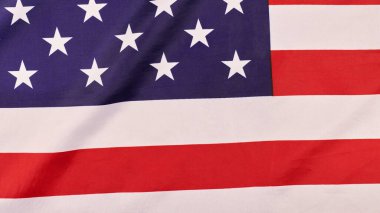 Amerika Birleşik Devletleri bayrağı. Ulusal Amerikan bayrağı, Amerika 'nın vatansever sembolü. Rüzgarda dalgalanan bayrağı kapat.