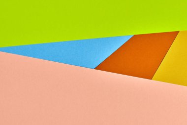 Çok renkli kağıt arkaplan. Soyut renkli kağıt dokusu, kopyalama alanı. Tasarım için parlak renkler geometrik arkaplan. Sunumlar için renk boşluğu.
