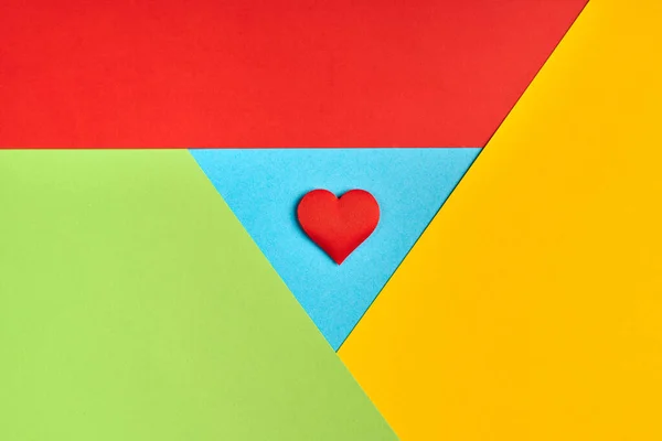 Favorite browser logo from paper. Red, yellow, green and blue colors. Colorful and bright logo with red heart.