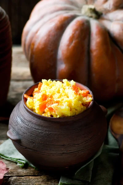 On costing various pumpkin dishes on a rural background. — Stock Photo, Image
