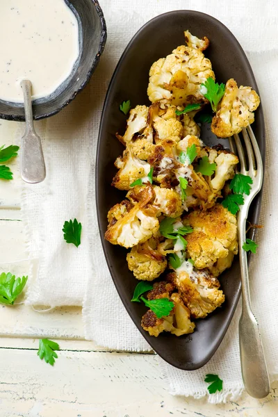 The baked cauliflower with sauce. — Stock Photo, Image