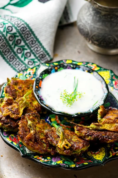 Vegetable marrows fritters with joghurt — Stock Photo, Image