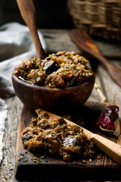 Eggplant paste in a wooden bowl — Stock Photo, Image