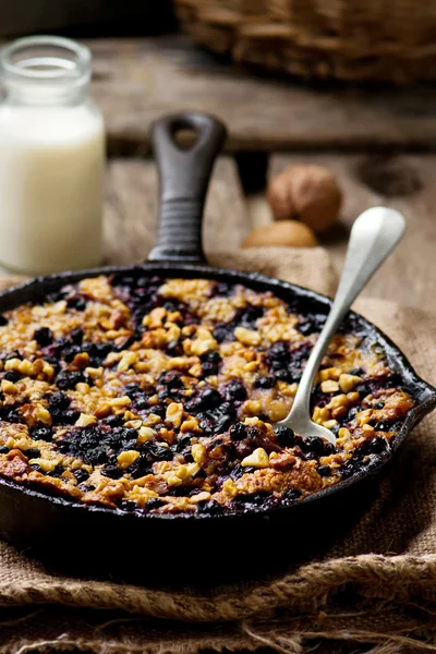 Baked Oatmeal in a pig-iron frying pan — Stock Photo, Image